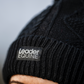 black beanie knitted with leader equine logo