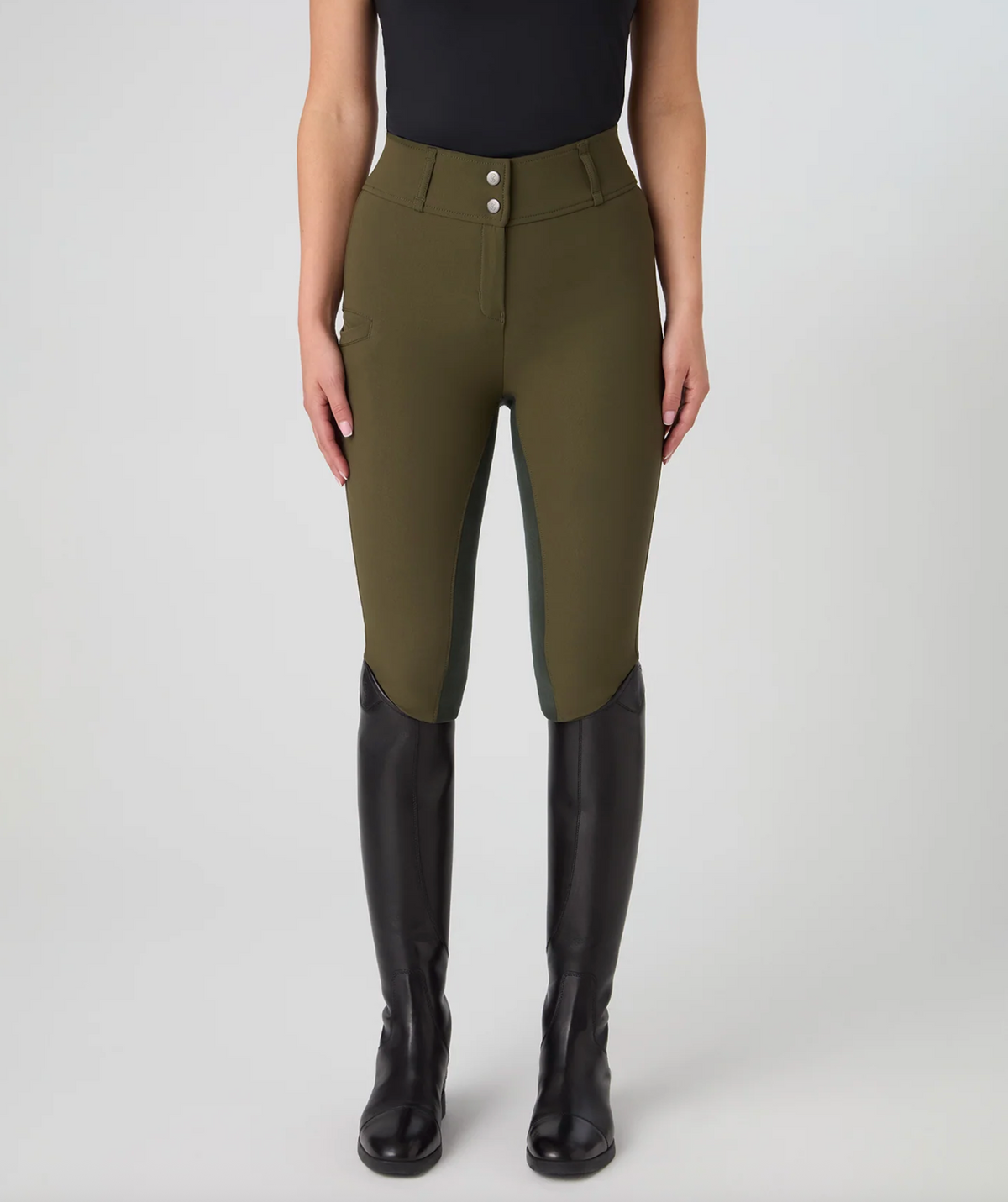 A model wearing ps of sweden olive green equestrian riding breeches with black suede knee panels and black riding boots, shown from the waist down against a light gray studio background.
