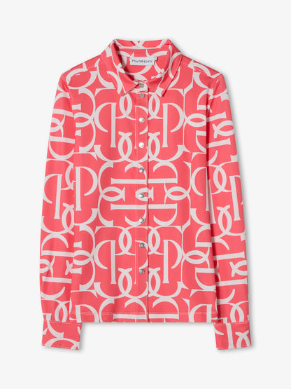 Pink shirt with white pattern on a white background